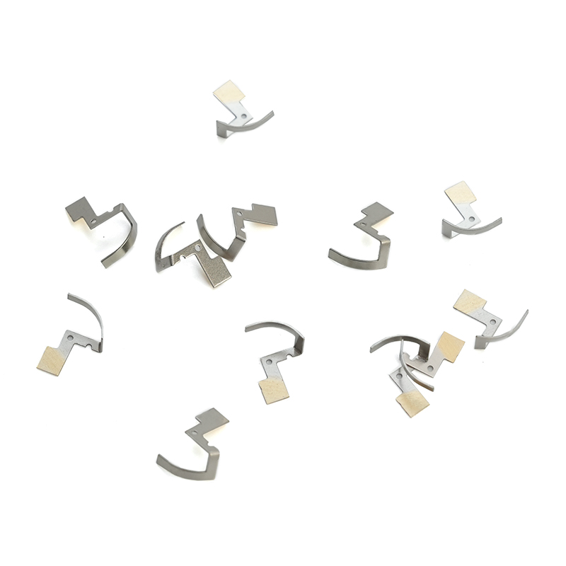 Ruostumattomasta teräksestä valmistettu leimausmetalli sirpale